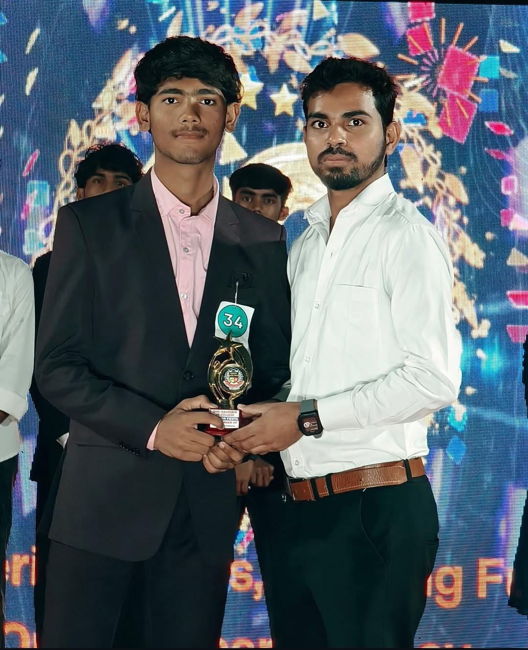 Students receiving an award on stage