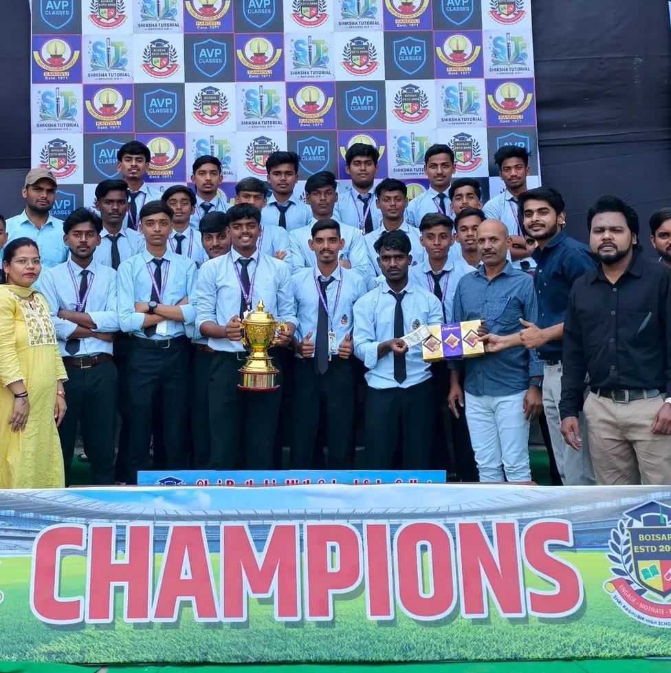 Champions team photo with a trophy